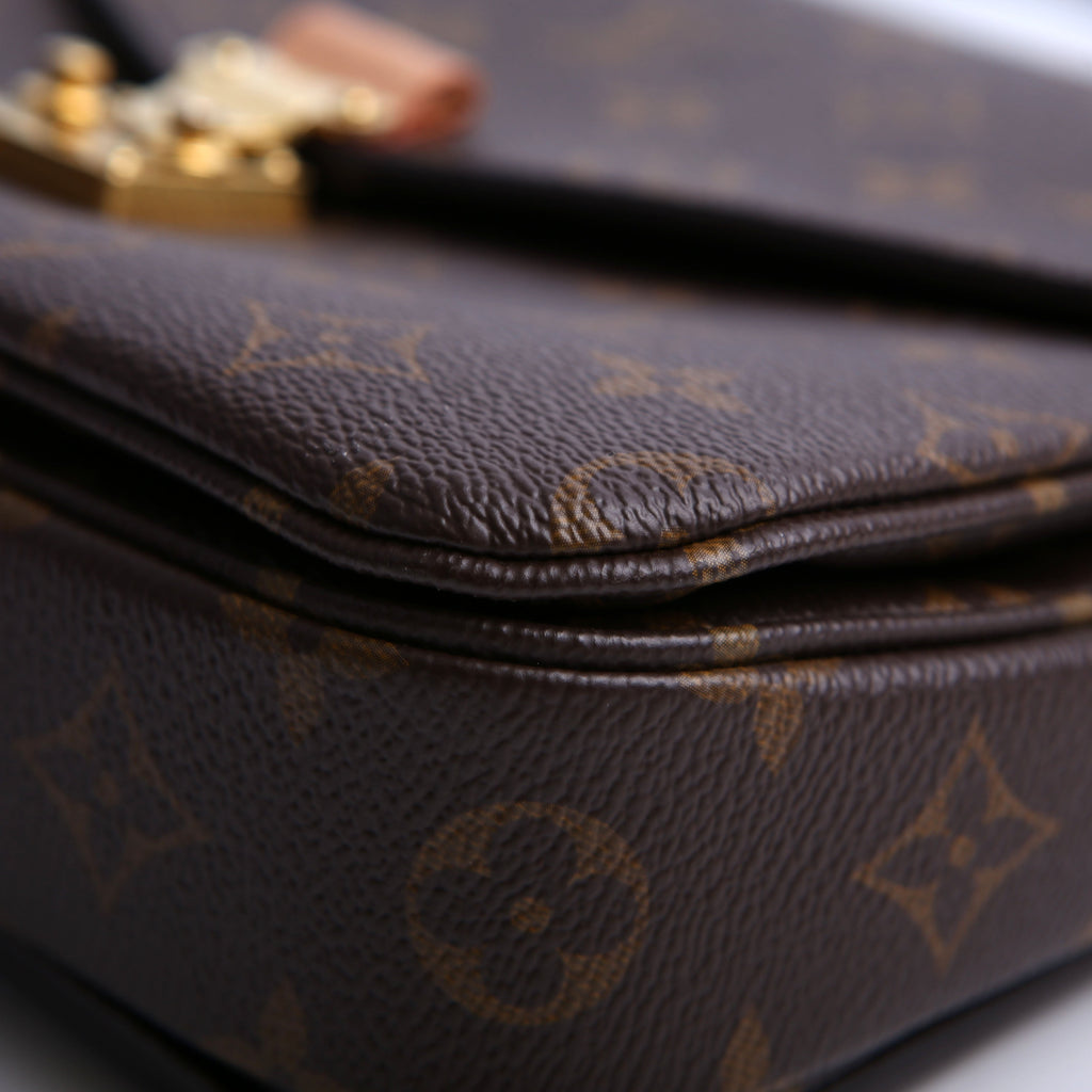 Pochette Metis Monogram