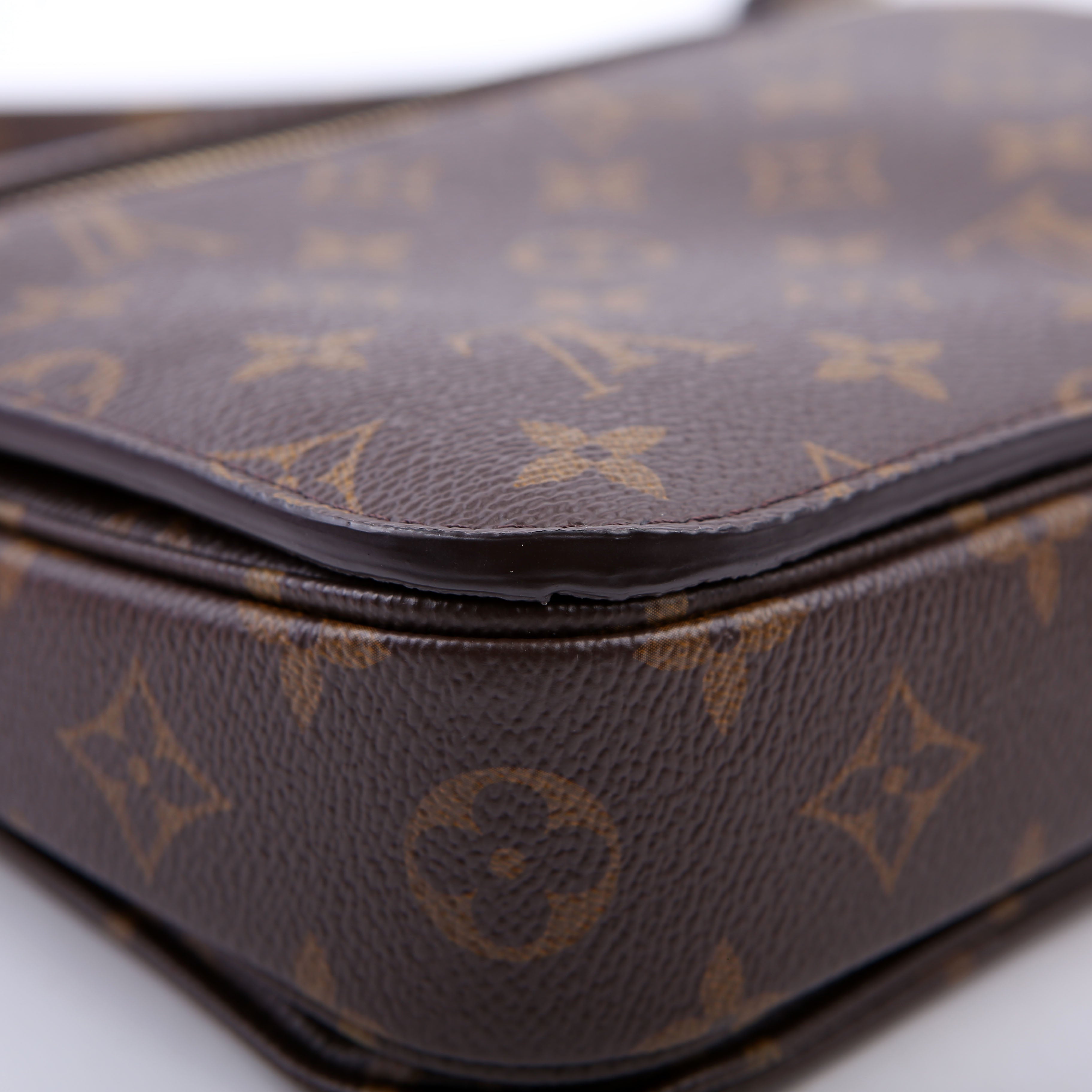 Pochette Metis Monogram