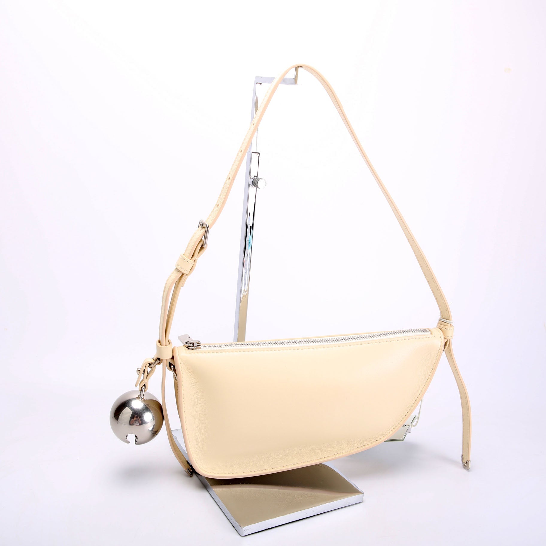 Mini Shield Leather Sling Bag Cream