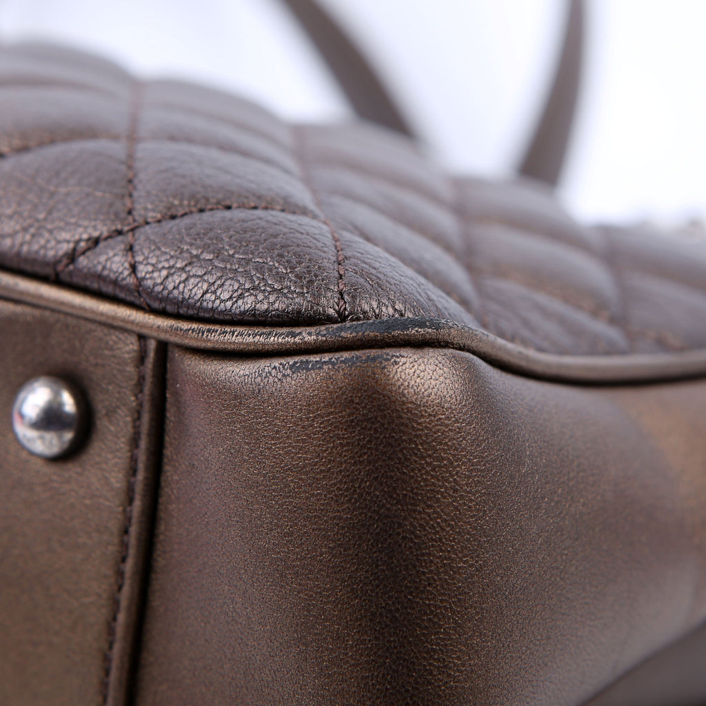 Rock in Rome Quilted Caviar Tote 23M Bronze