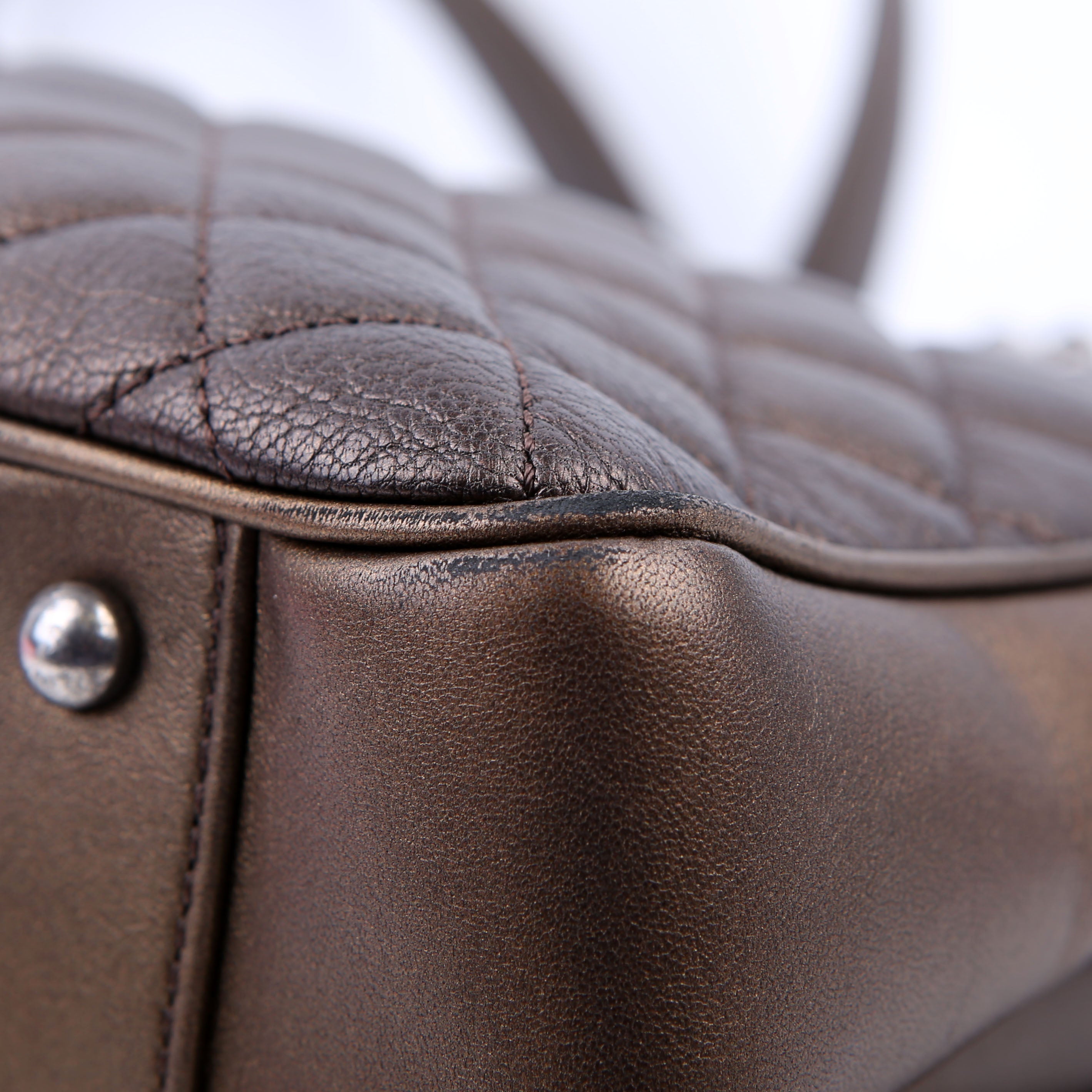 Rock in Rome Quilted Caviar Tote 23M Bronze