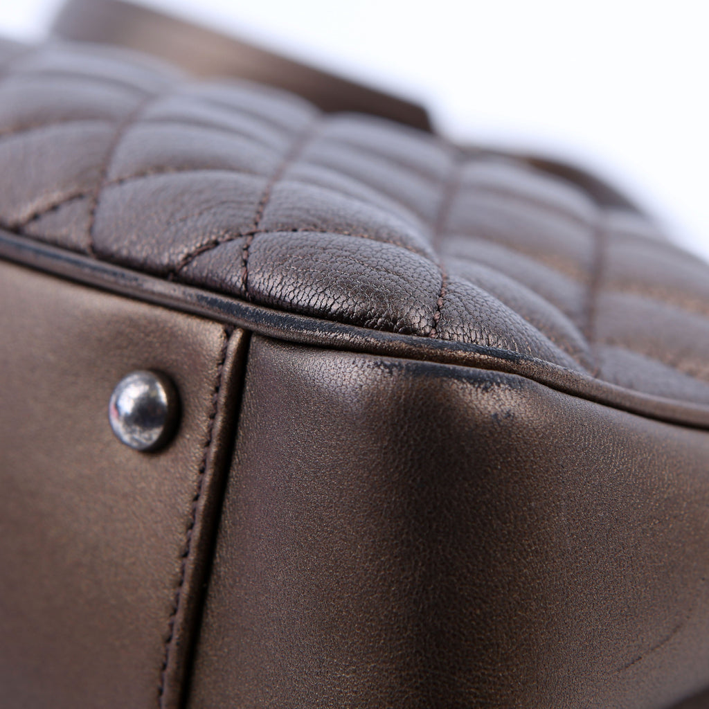 Rock in Rome Quilted Caviar Tote 23M Bronze