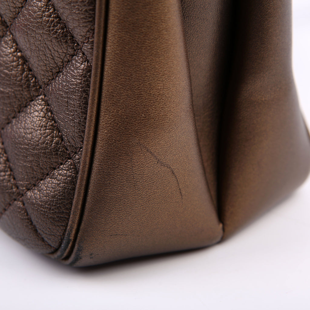 Rock in Rome Quilted Caviar Tote 23M Bronze
