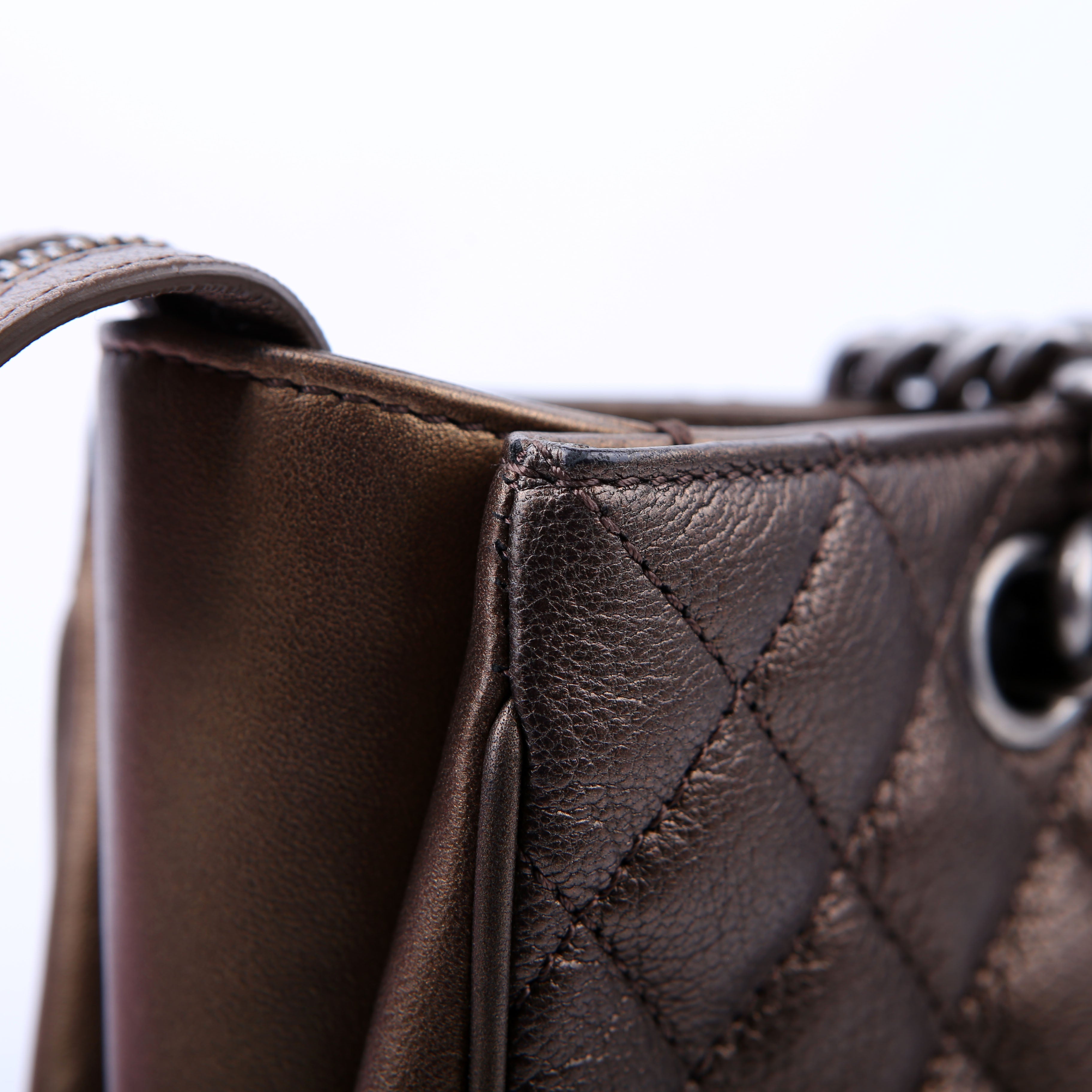 Rock in Rome Quilted Caviar Tote 23M Bronze