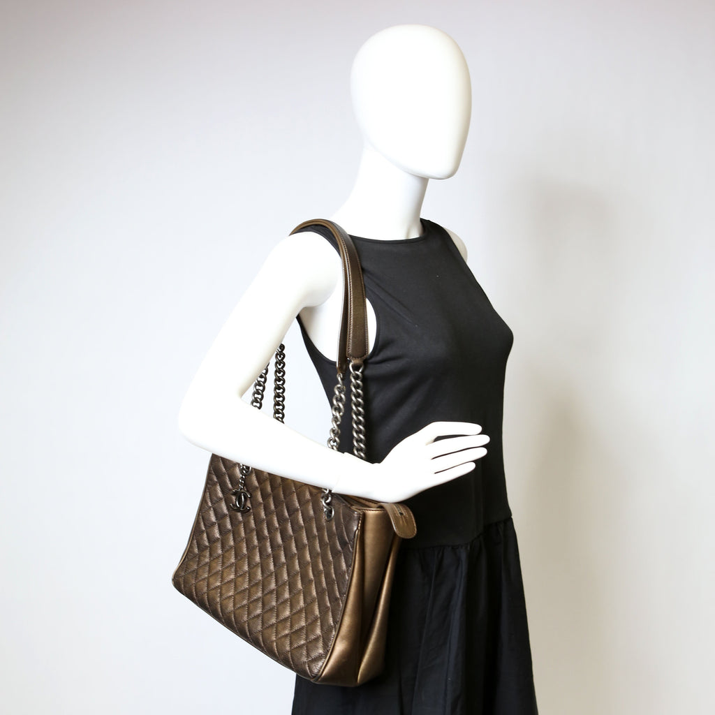 Rock in Rome Quilted Caviar Tote 23M Bronze