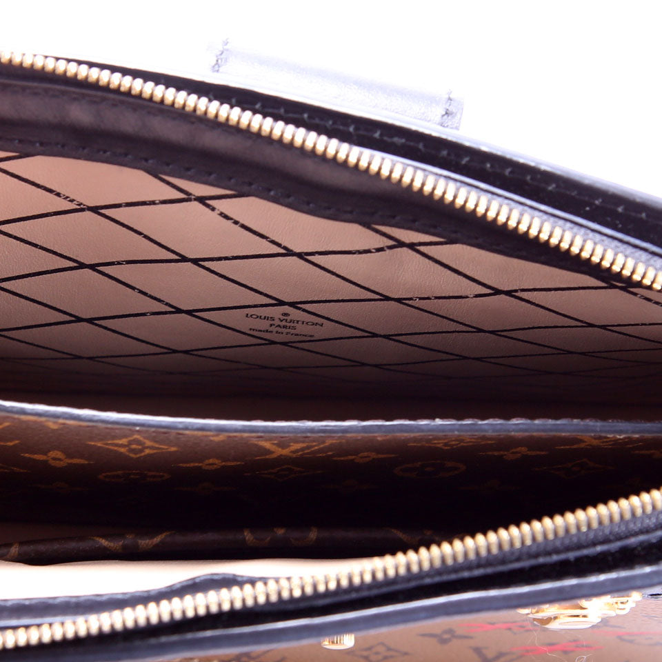 Trunk Clutch Reversed Monogram Black