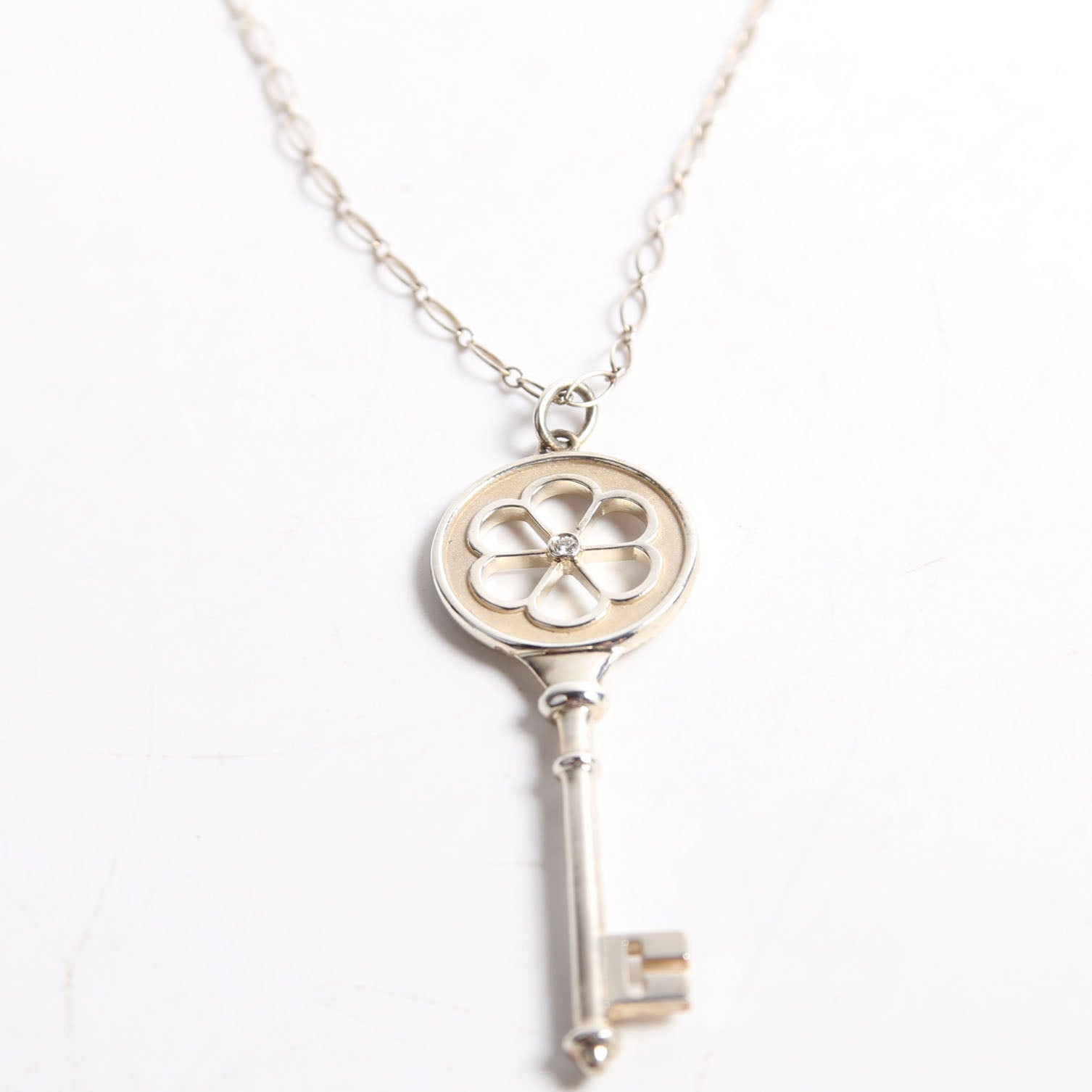 NECKLACE: BLOSSOM FLOWER KEY PENDANT 925