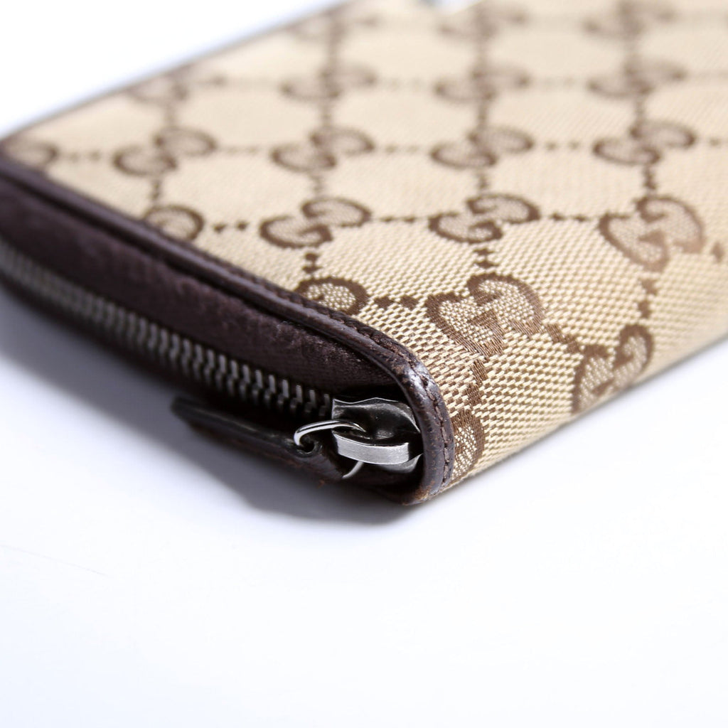 112724 GG Canvas Zip Around Wallet Brown