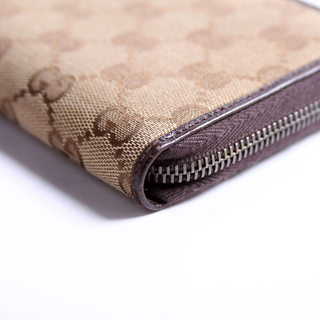 112724 GG Canvas Zip Around Wallet Brown