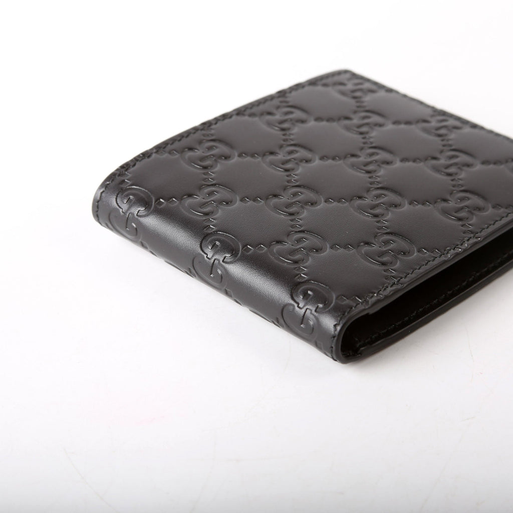 779836 GG Emblem Bi-Fold Wallet Black