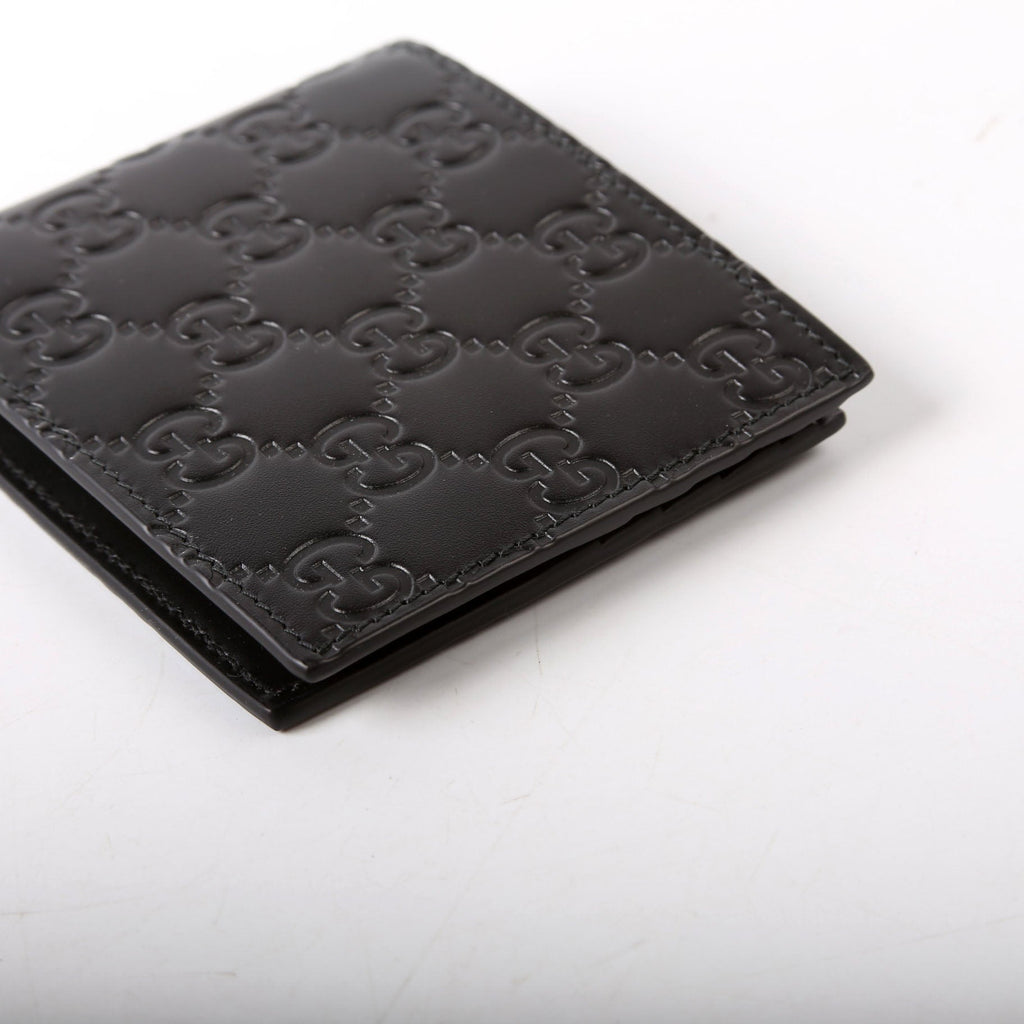779836 GG Emblem Bi-Fold Wallet Black
