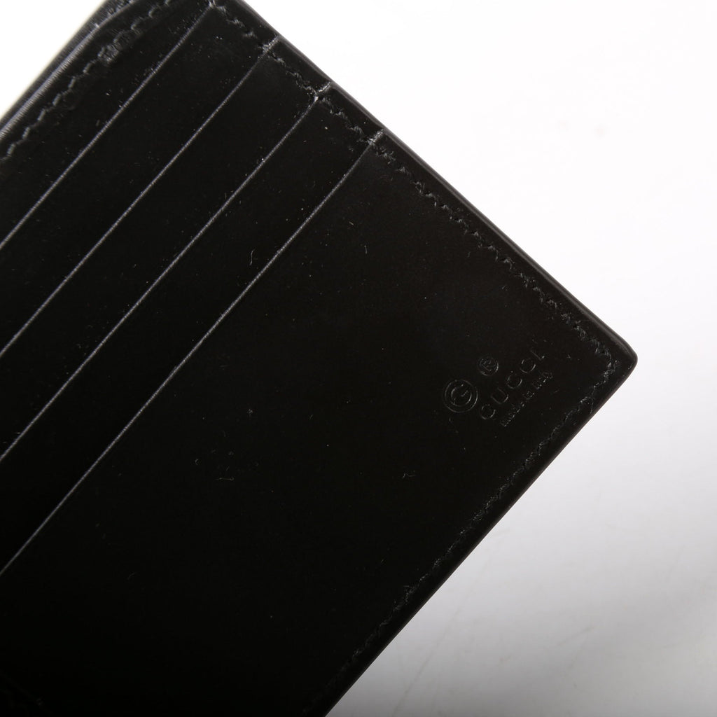 779836 GG Emblem Bi-Fold Wallet Black