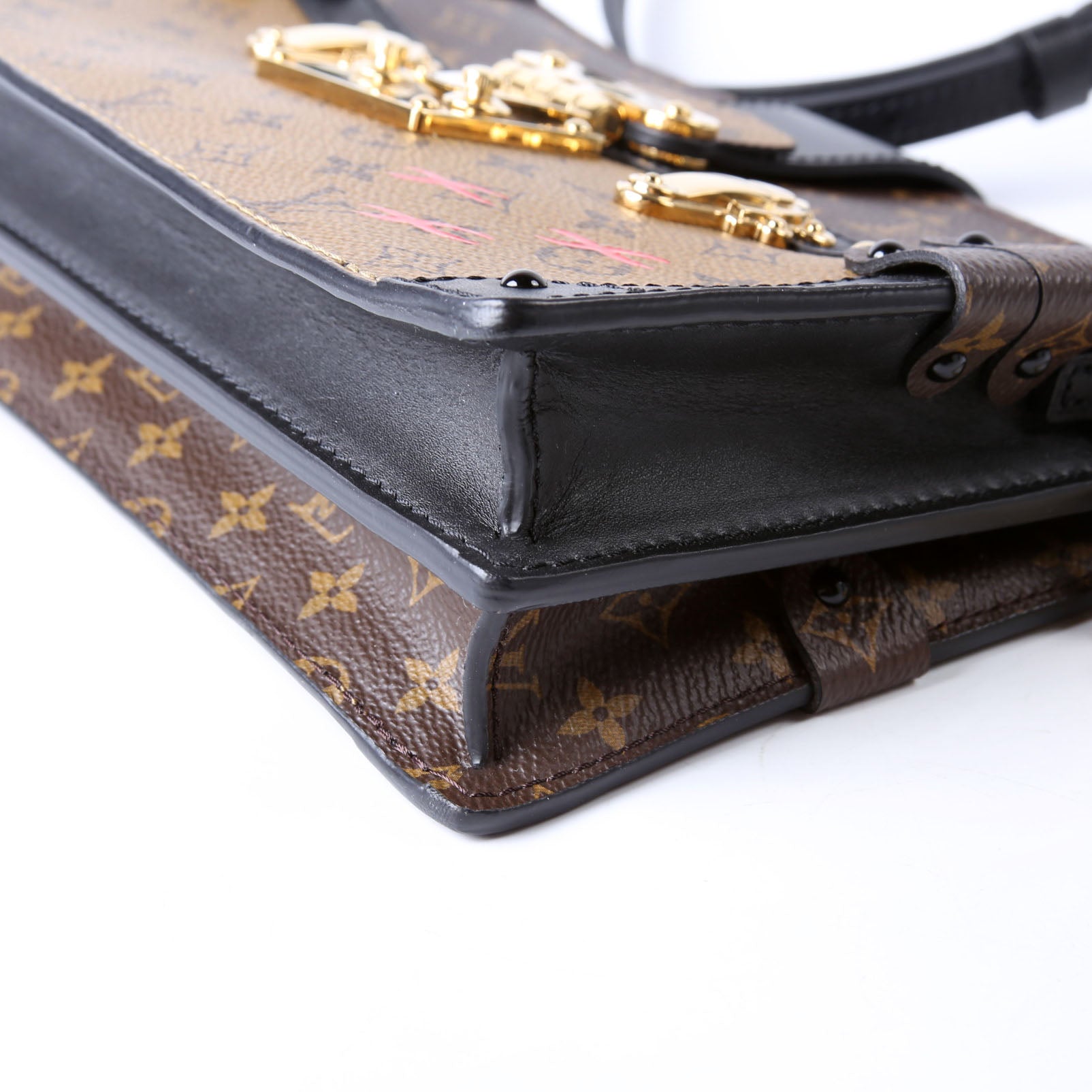 Trunk Clutch Reverse Monogram