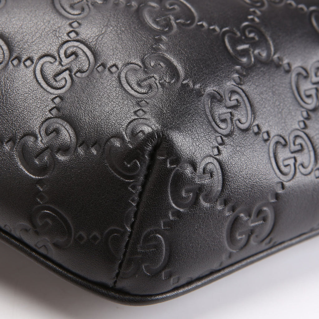 779896 GG Embossed Belt Bag Black