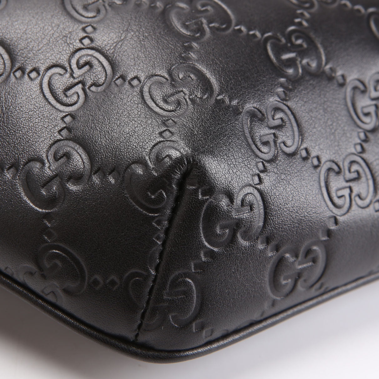 779896 GG Embossed Belt Bag Black