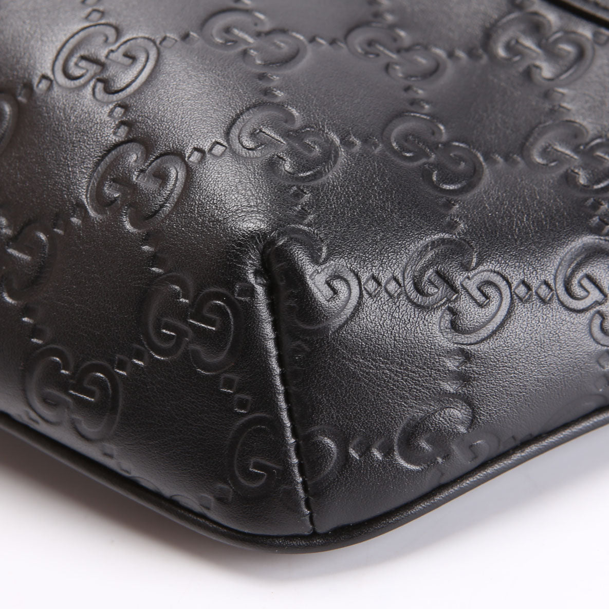 779896 GG Embossed Belt Bag Black