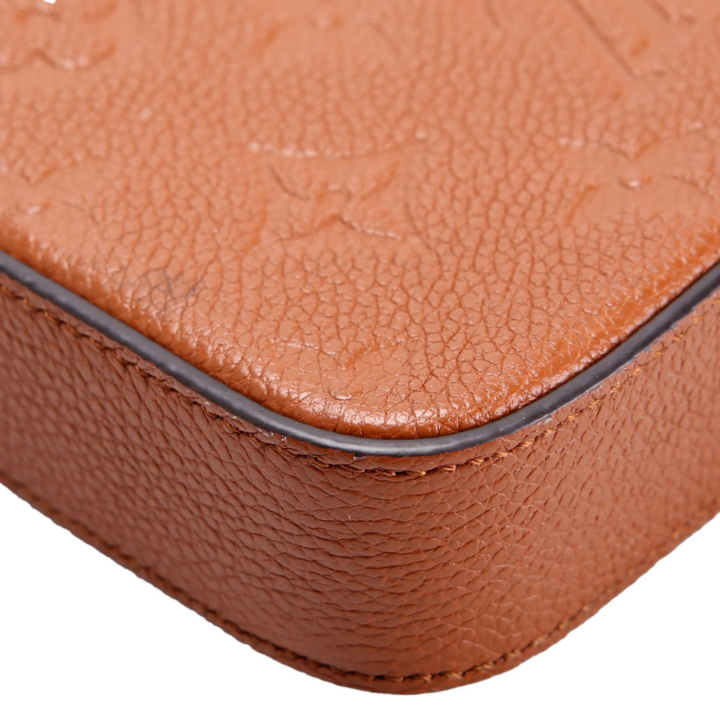 Pochette Felicie Empreinte Brown