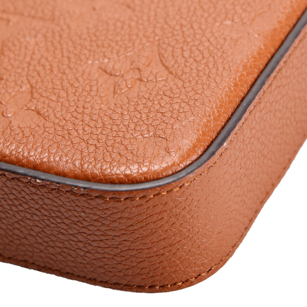 Pochette Felicie Empreinte Brown