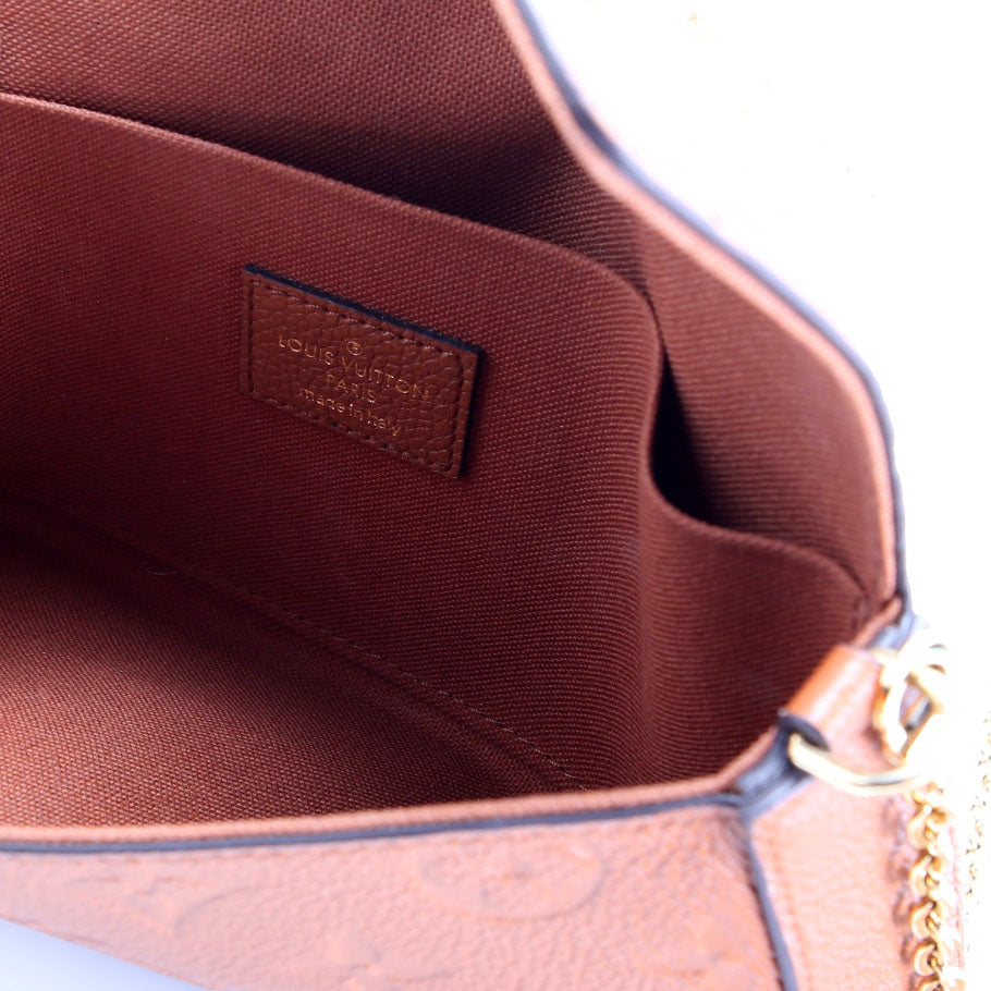 Pochette Felicie Empreinte Brown