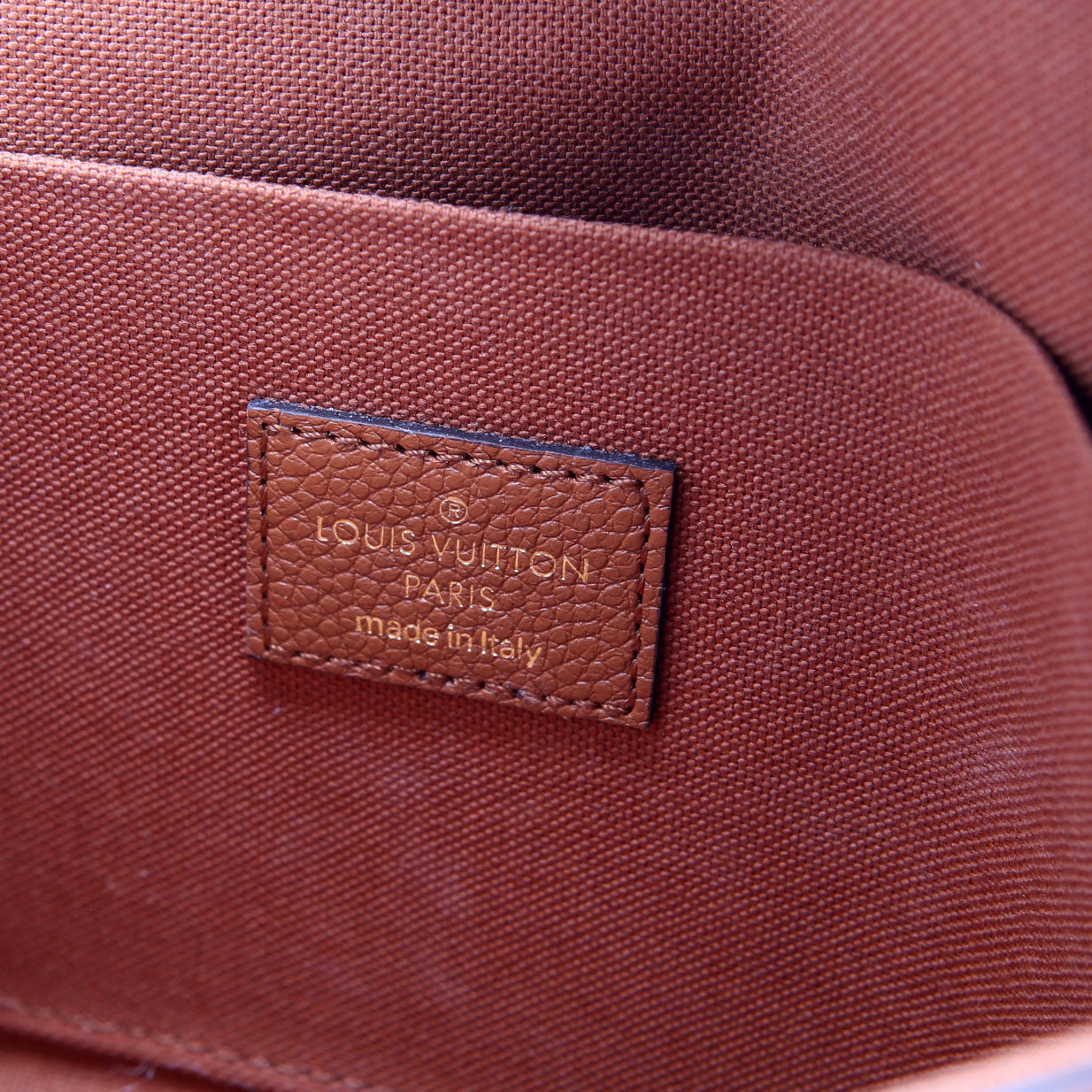 Pochette Felicie Empreinte Brown