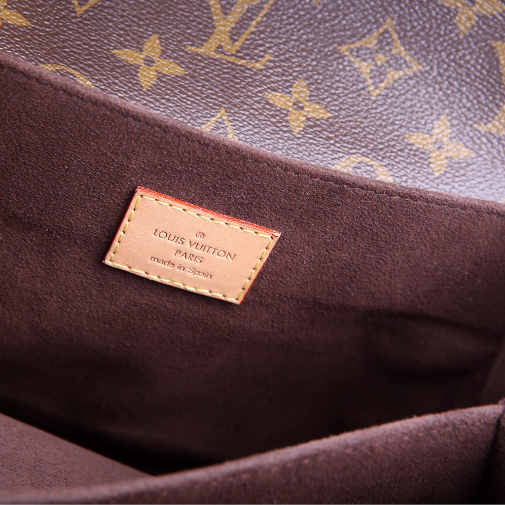 Pochette Metis Monogram