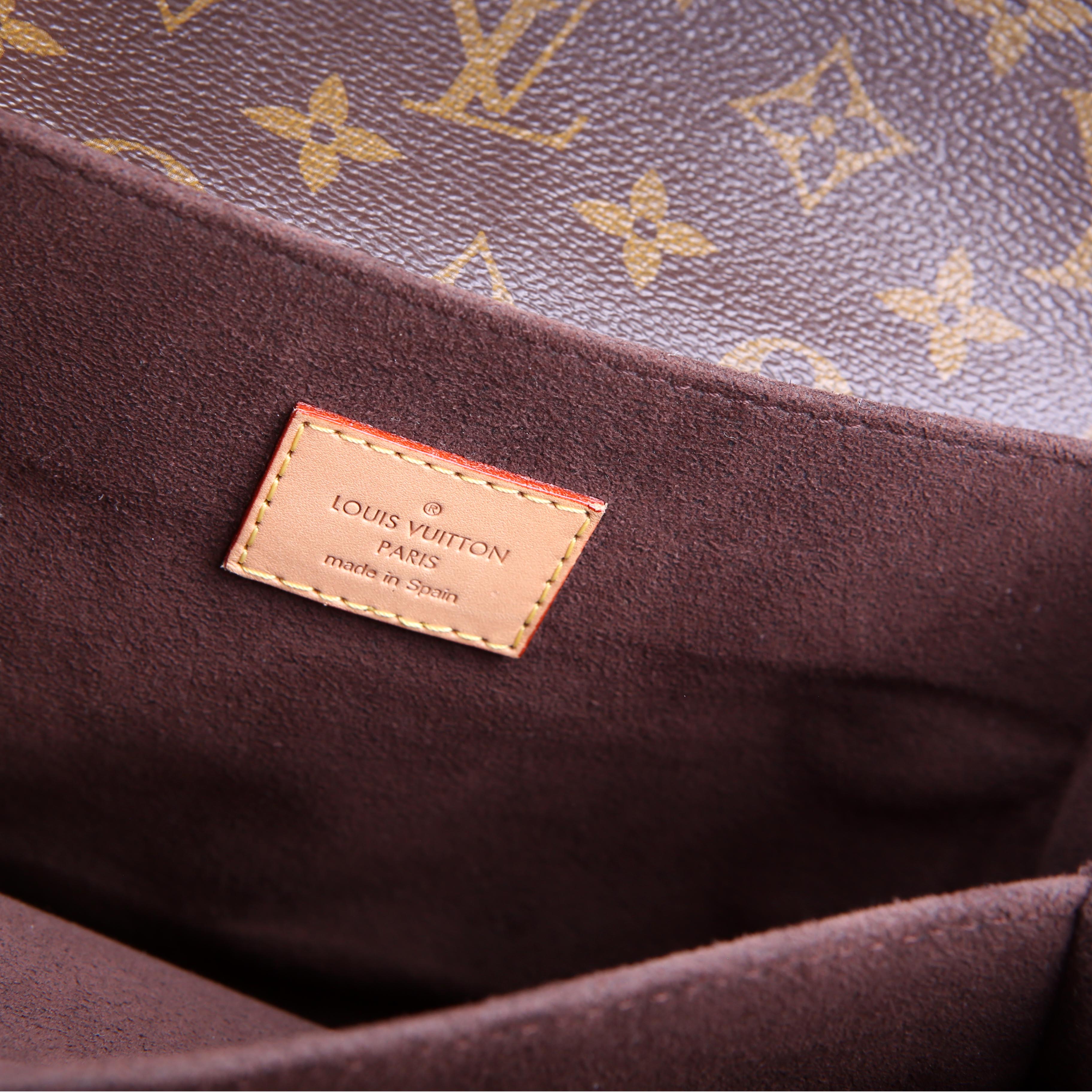 Pochette Metis Monogram