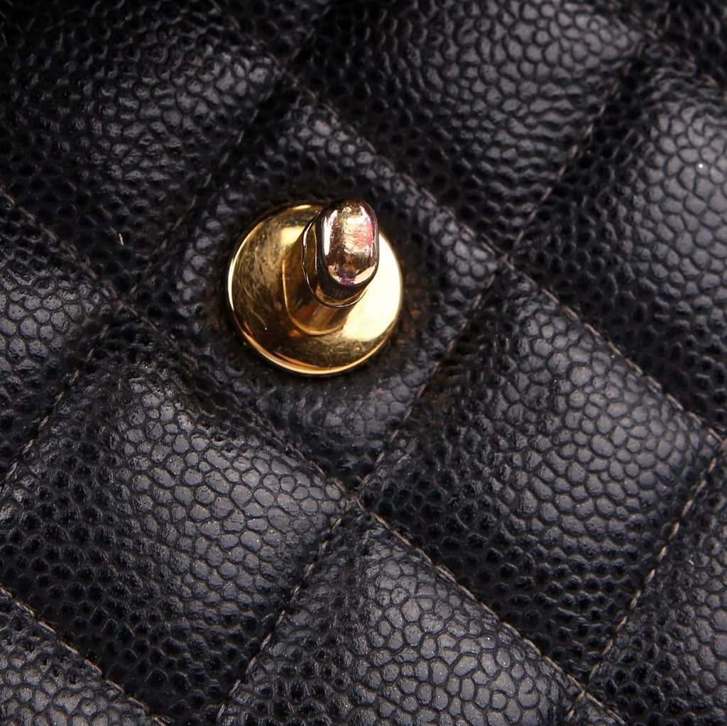 Classic Flap Jumbo Caviar 06-09M Black