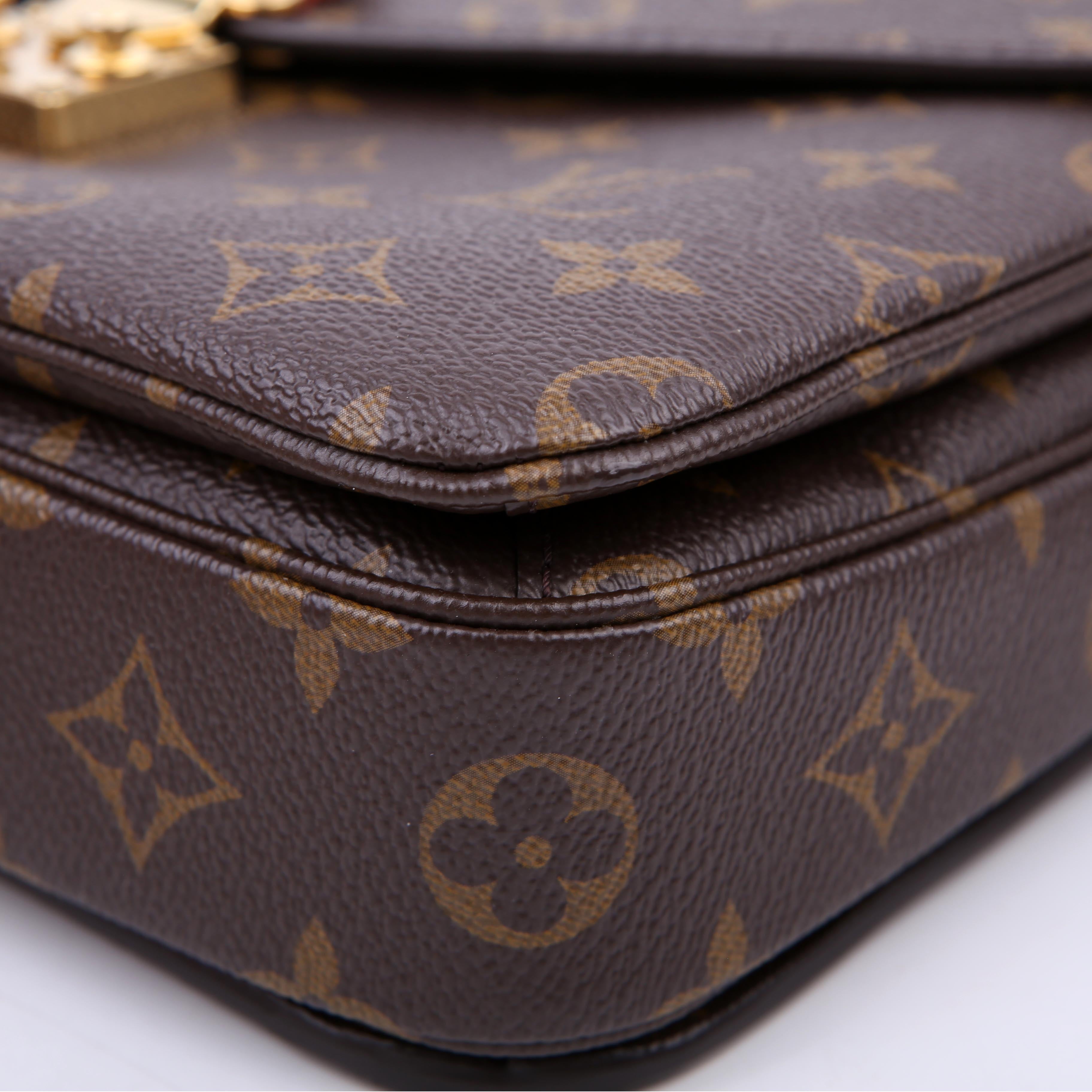 Pochette Metis Monogram