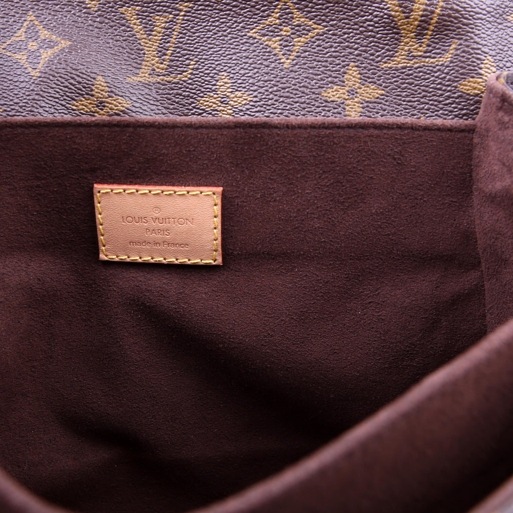 Pochette Metis Monogram