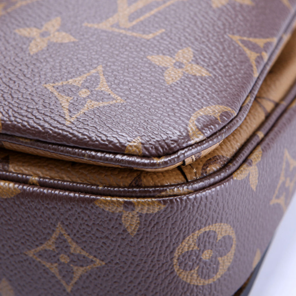Pochette Metis Reverse Monogram