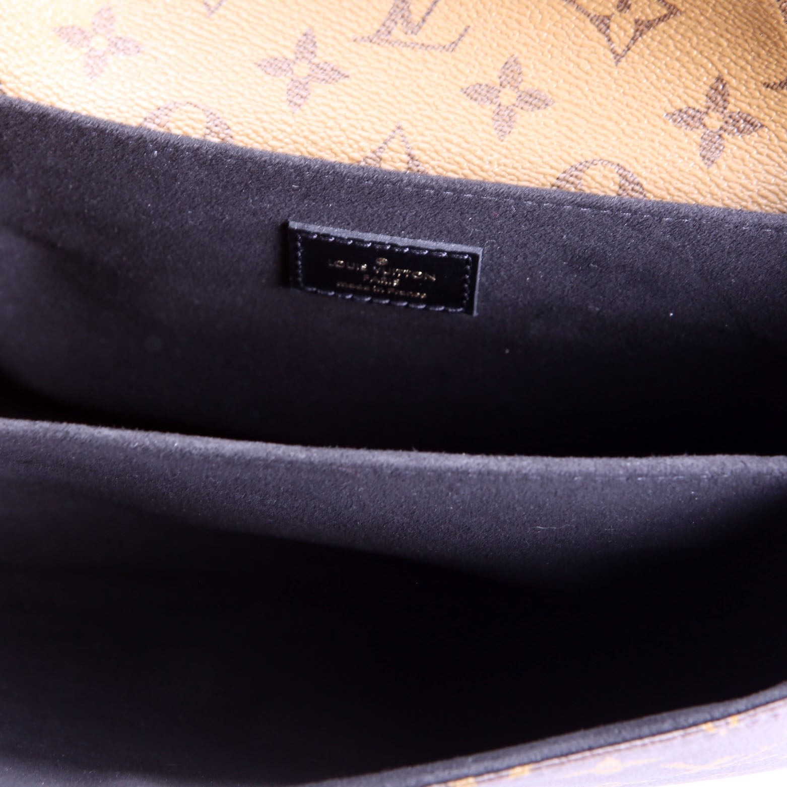 Pochette Metis Reverse Monogram