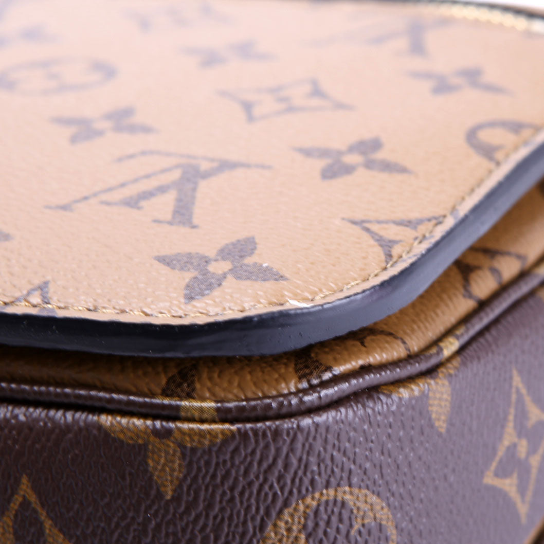 Pochette Metis Reversed Monogram