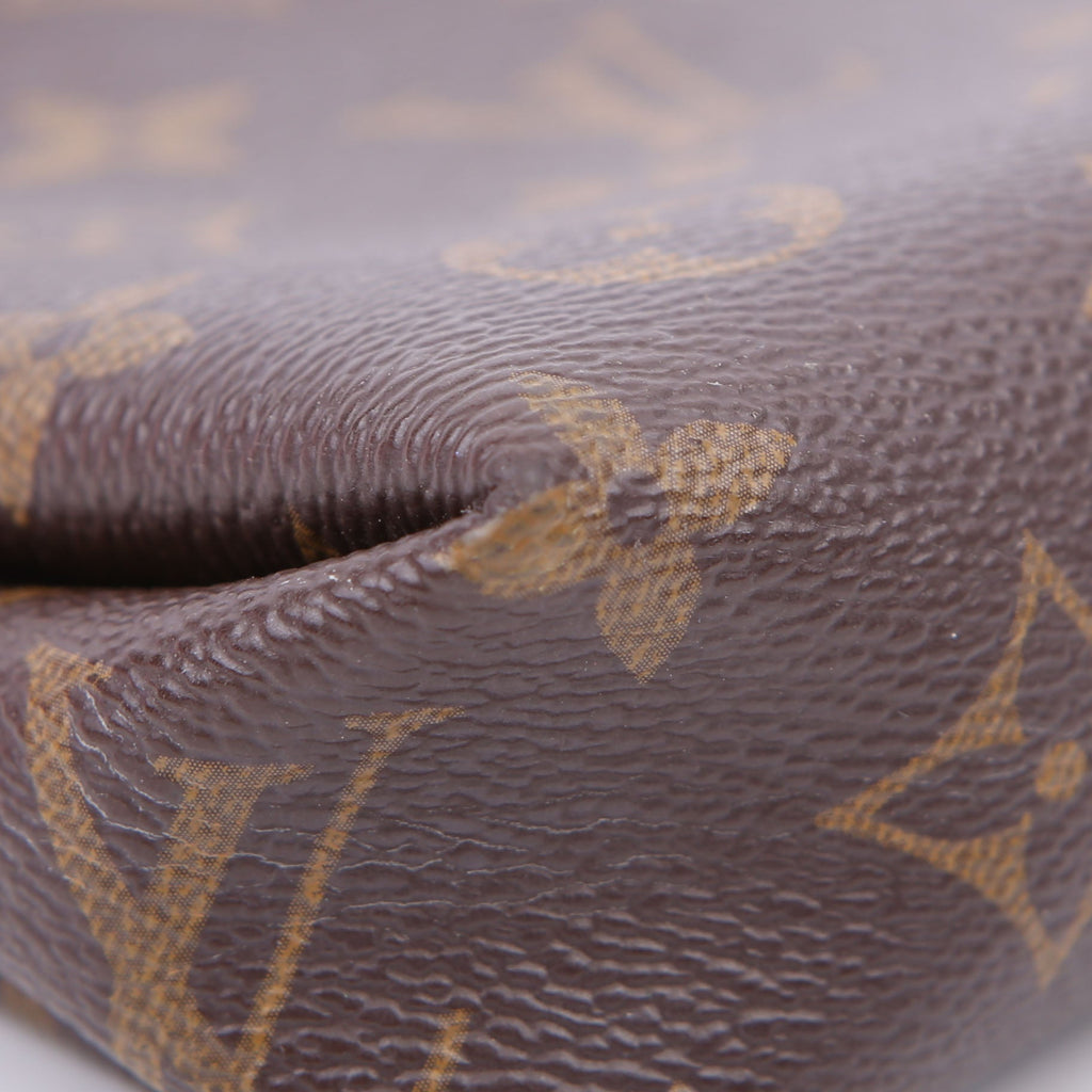 Pallas Clutch Monogram