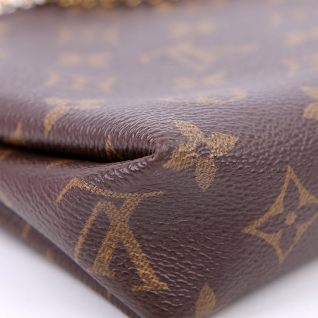 Pallas Clutch Monogram