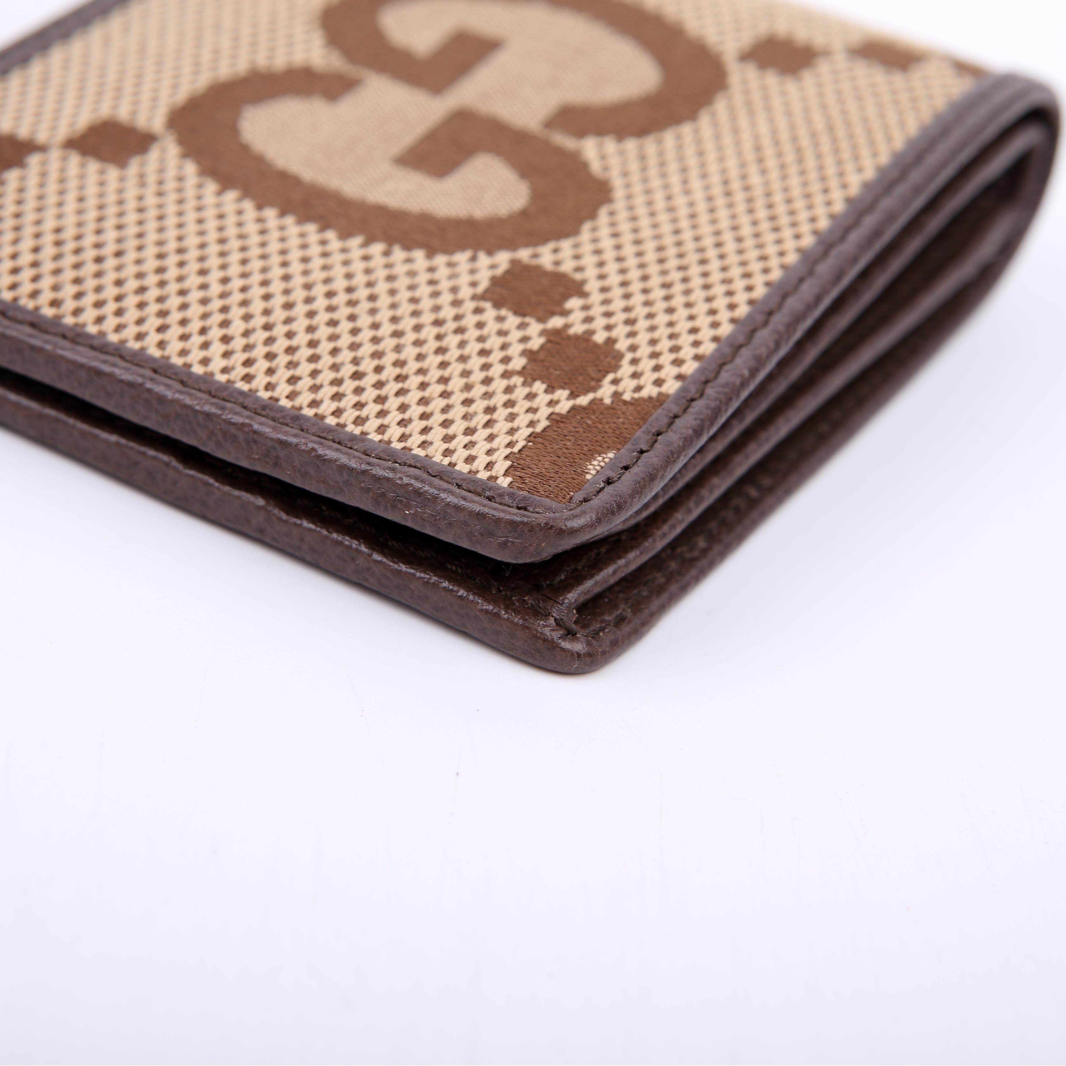 Gucci 699308 Jumbo GG Canvas Bifold Wallet