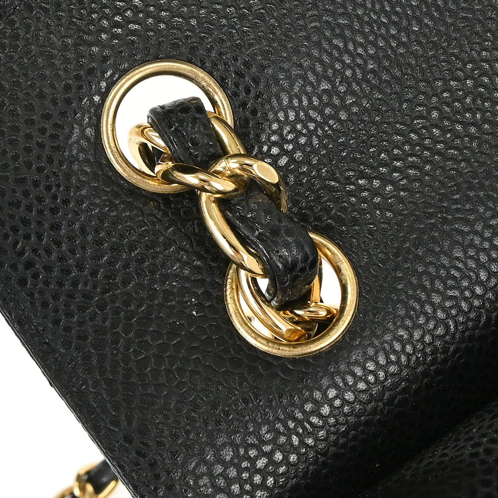 Chanel 2011 Black Caviar Skin Jumbo Classic Double Flap Shoulder Bag