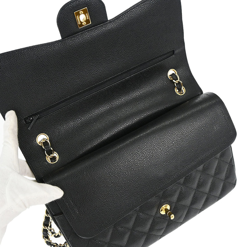 Chanel 2010-2011 Black Caviar Skin Jumbo Classic Double Flap Shoulder Bag