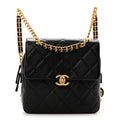 Chanel Shiny Caviar Quilted Chain Melody Backpack Black