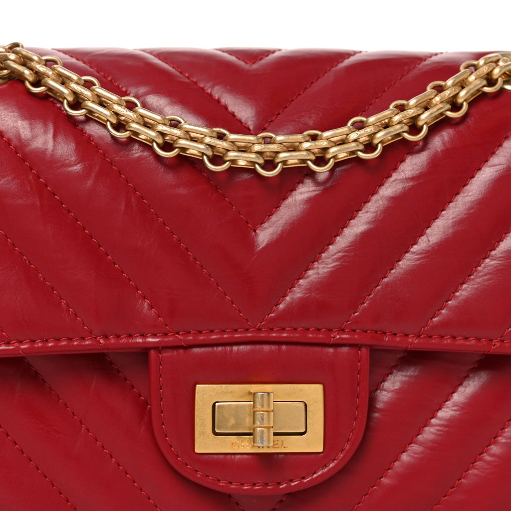 Chanel Aged Calfskin Chevron Quilted 2.55 Reissue Mini Flap Dark Red