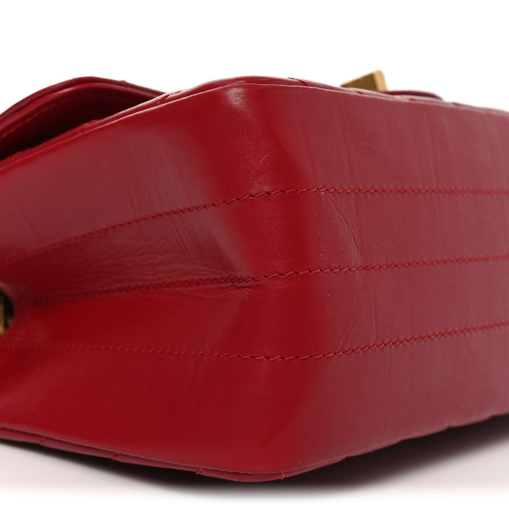 Chanel Aged Calfskin Chevron Quilted 2.55 Reissue Mini Flap Dark Red