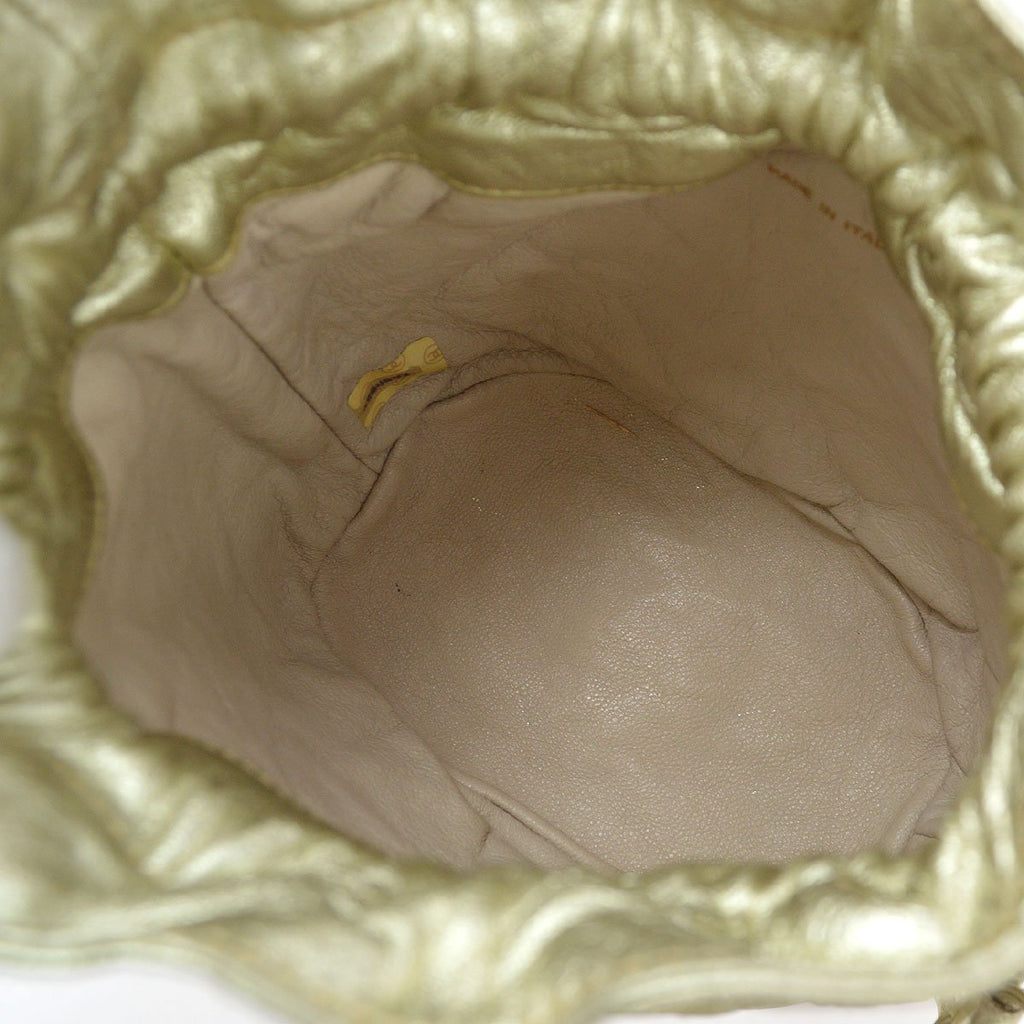CHANEL 1989-1991 Gold Lambskin Drawstring Bucket Bag