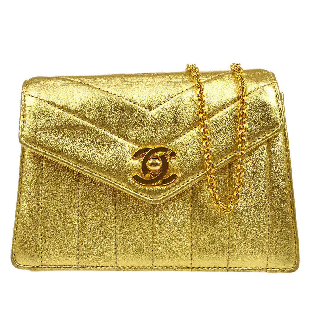 CHANEL 1991-1994 Chevron Letter Flap Vertical Bag Mini Gold Lambskin