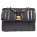 CHANEL 1994-1996 Small Vertical Straight Flap