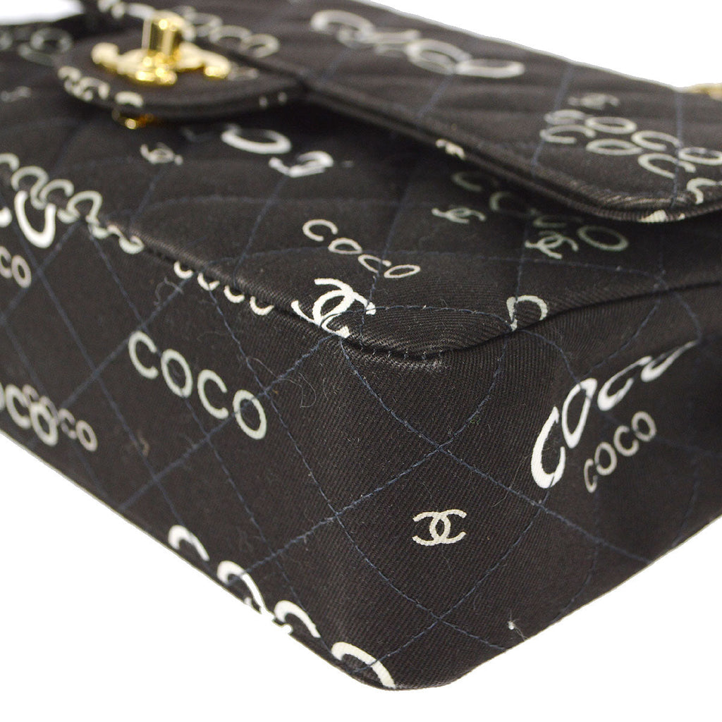 CHANEL 2001-2003 COCO patterned Classic Double Flap Medium Black Canvas