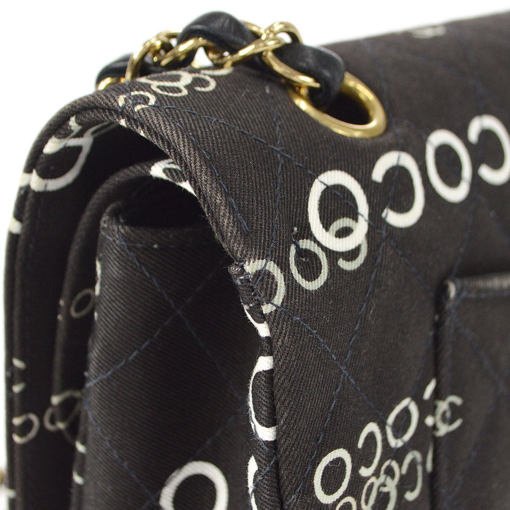 CHANEL 2001-2003 COCO patterned Classic Double Flap Medium Black Canvas