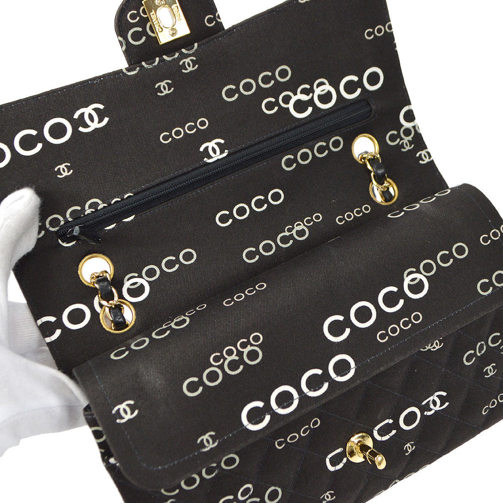 CHANEL 2001-2003 COCO patterned Classic Double Flap Medium Black Canvas