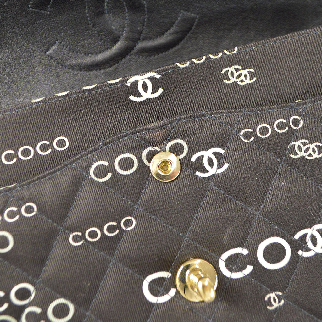 CHANEL 2001-2003 COCO patterned Classic Double Flap Medium Black Canvas