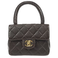 CHANEL 1994 Classic Flap Handbag Micro Brown Lambskin