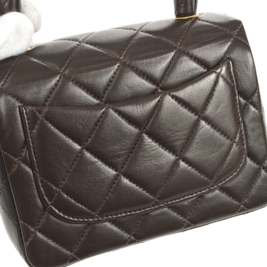 CHANEL 1994 Classic Flap Handbag Micro Brown Lambskin