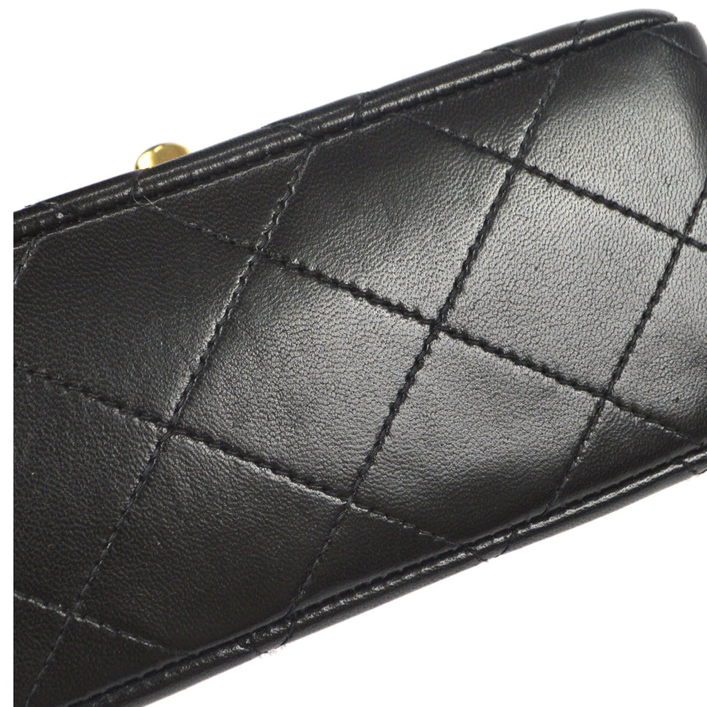 Chanel 1994 Classic Flap Handbag Micro Black Lambskin